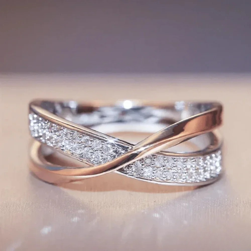 Anillo Bicolor Trenzado de Plata y Oro con Circonita | Joyería